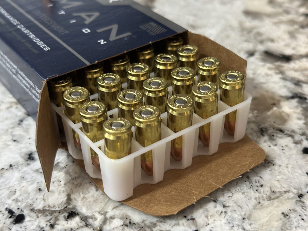 9mm cartridges in a factory box