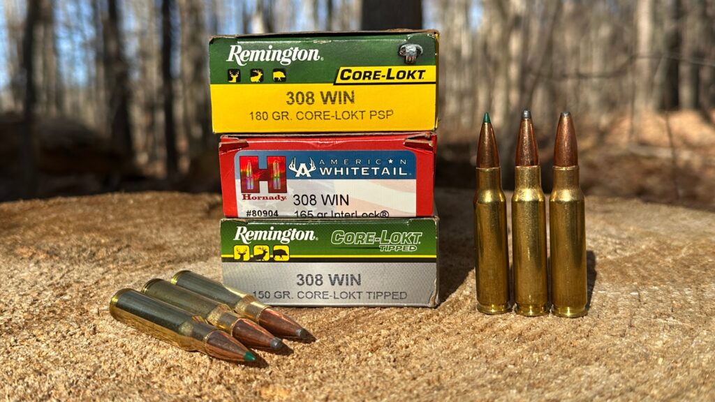 different 308 cartridges on a stump